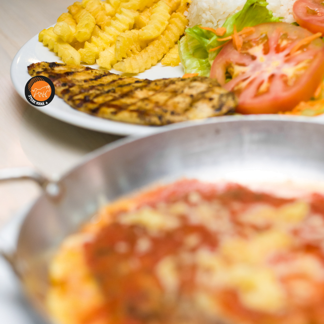 File de frango Parmegiana steak mana